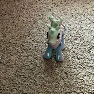 cute blue pink purple and mint green 3D printed unicorn toy